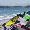 Kites parked on the beach during a break