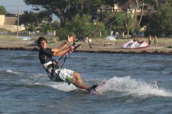 Roberto, our first student ever, kitesurfing at the homespot Sa Marina